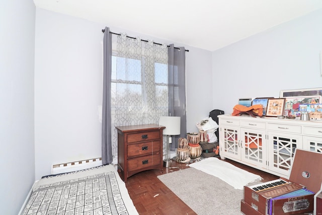 bedroom featuring baseboard heating