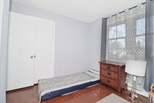 bedroom featuring baseboard heating