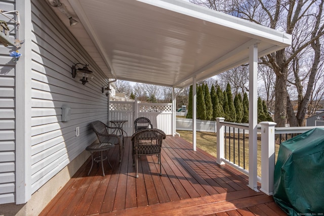 wooden deck featuring fence and grilling area