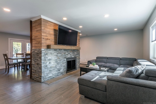 34 Indian Hill Rd, New Fairfield, CT 06812 - living area with a stone fireplace, recessed lighting, a baseboard radiator, and wood finished floors