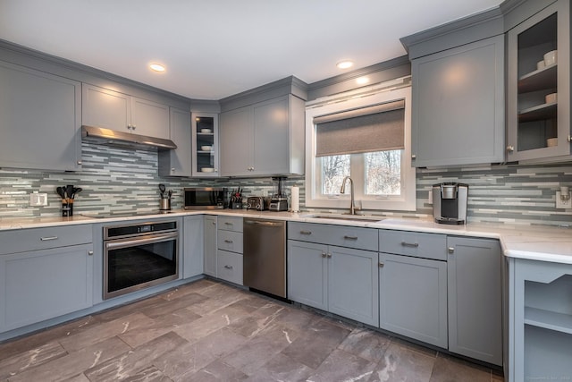 34 Indian Hill Rd, New Fairfield, CT 06812 - kitchen featuring tasteful backsplash, under cabinet range hood, gray cabinets, appliances with stainless steel finishes, and a sink