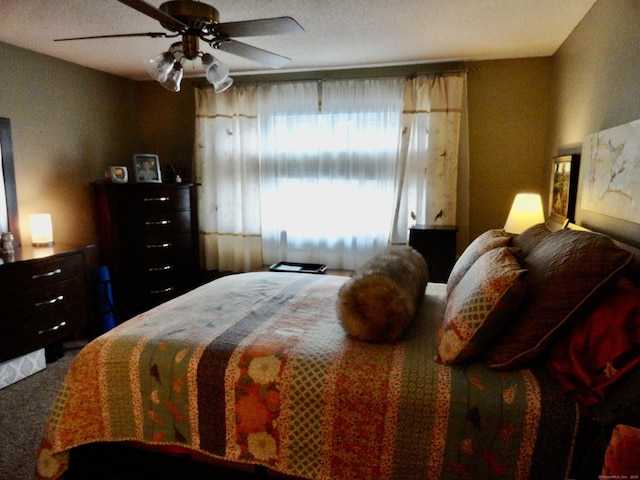 carpeted bedroom featuring a ceiling fan