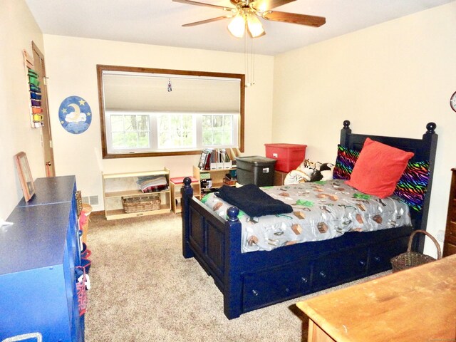 bedroom with carpet and a ceiling fan