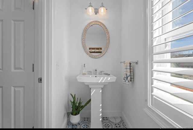 bathroom featuring baseboards