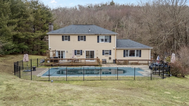 1557 Georges Hill Rd, Southbury, CT 06488 - rear view of property with a deck, a forest view, a chimney, and a shingled roof