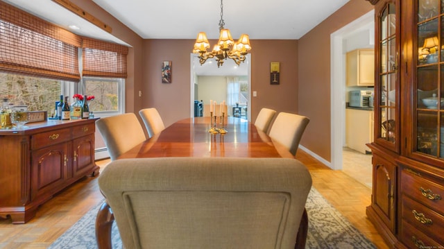 1557 Georges Hill Rd, Southbury, CT 06488 - dining area with a chandelier and a baseboard radiator