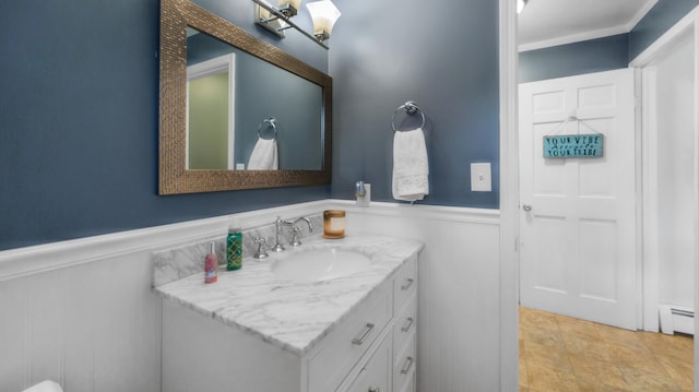 1557 Georges Hill Rd, Southbury, CT 06488 - bathroom with vanity, wainscoting, and a baseboard radiator