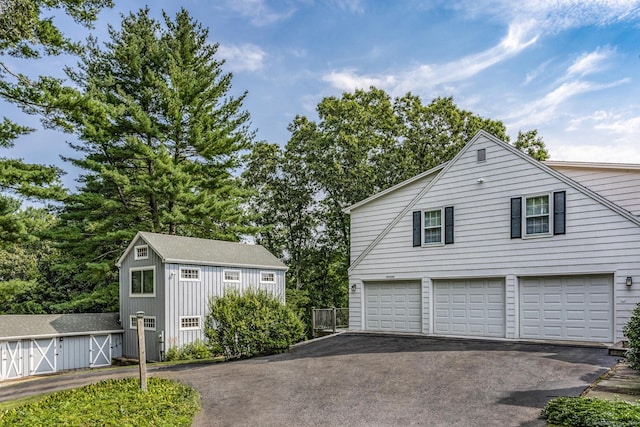 garage featuring driveway