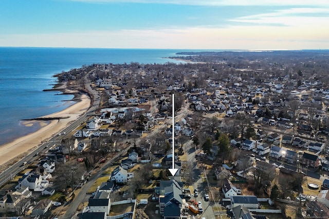 aerial view featuring a water view and a beach view