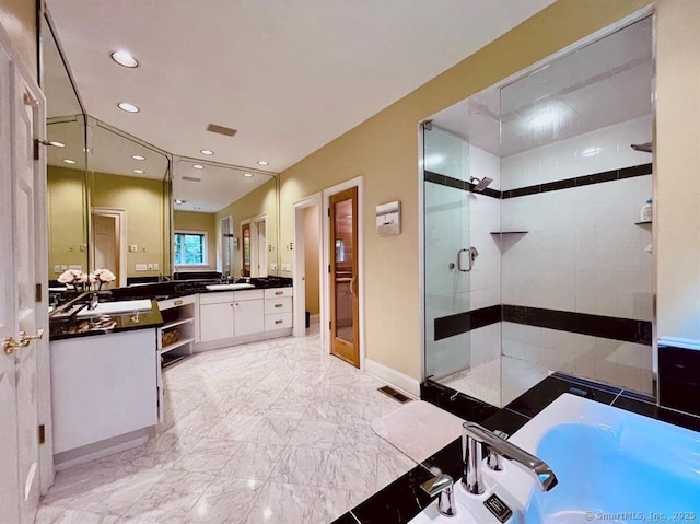 bathroom with a tub to relax in, vanity, visible vents, marble finish floor, and a stall shower