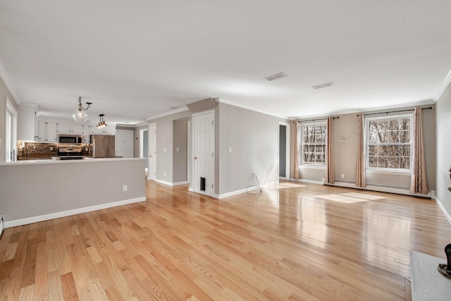 unfurnished living room with light wood finished floors, visible vents, baseboards, and crown molding