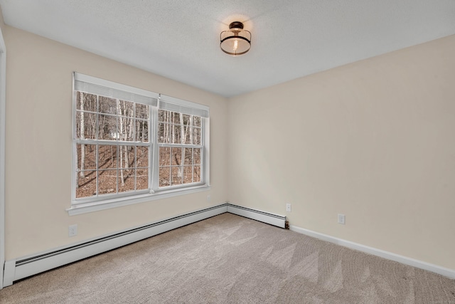 unfurnished room featuring baseboards, carpet flooring, a textured ceiling, and baseboard heating