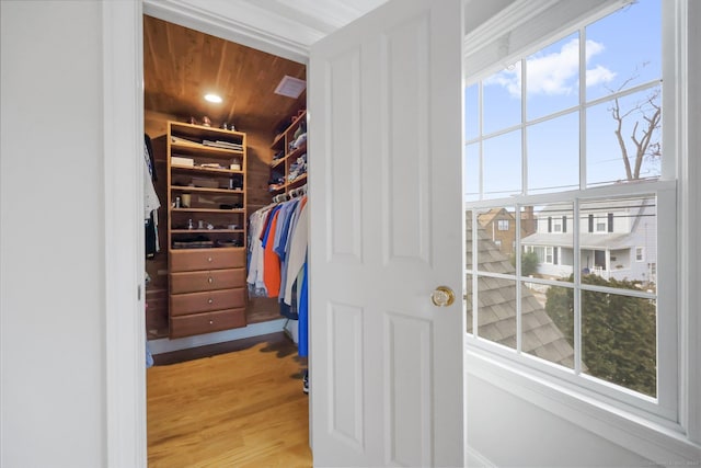 spacious closet with light wood finished floors