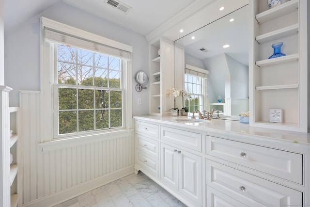 bathroom with visible vents, built in features, recessed lighting, marble finish floor, and vanity