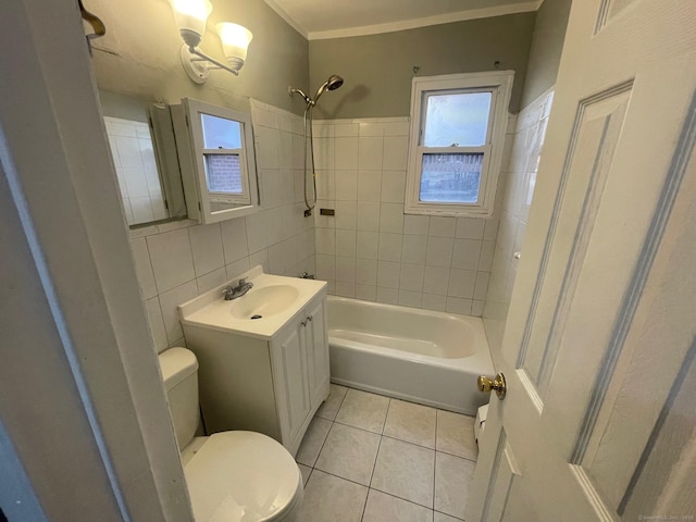 full bathroom with toilet, tile patterned flooring, vanity, washtub / shower combination, and tile walls