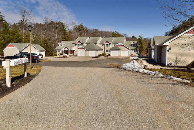 view of road featuring street lighting and a residential view