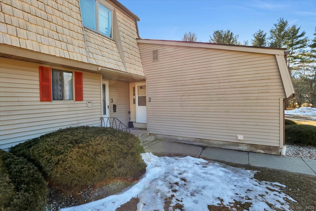 2 Locust Cir Unit 2, Rocky Hill, CT 06067 - snow covered property entrance featuring mansard roof