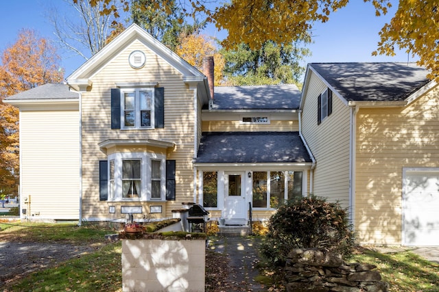 view of front of property featuring a chimney