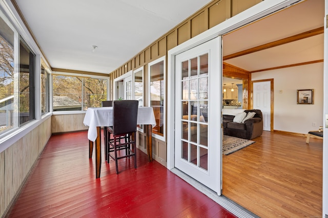 sunroom with wood finished floors