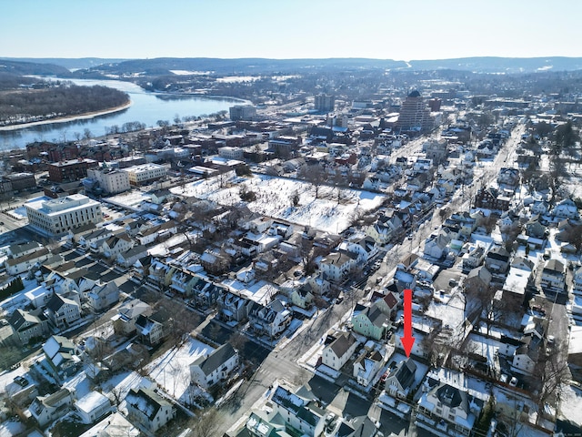 drone / aerial view with a water view