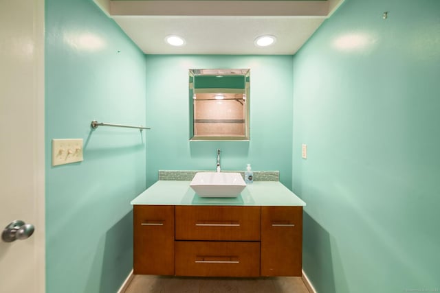 bathroom featuring vanity and baseboards