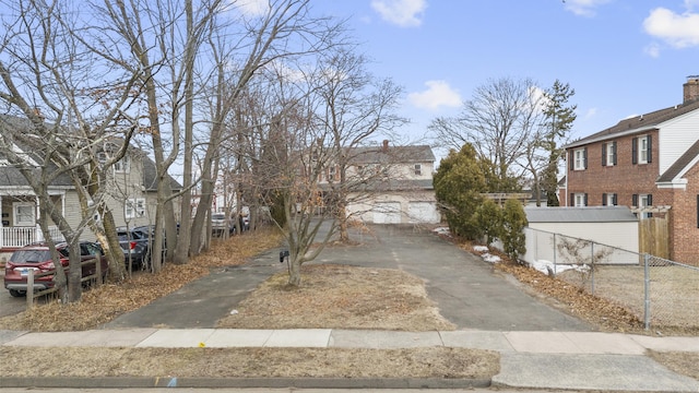 exterior space with sidewalks and a residential view