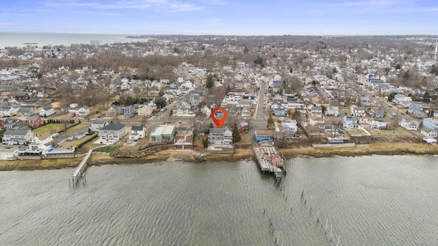 aerial view featuring a residential view and a water view