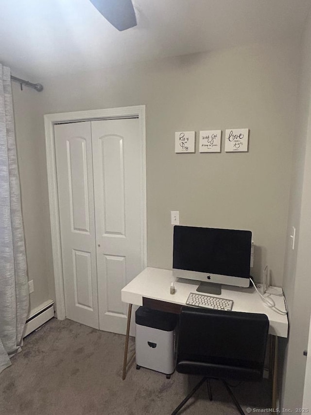 home office featuring carpet and a baseboard heating unit