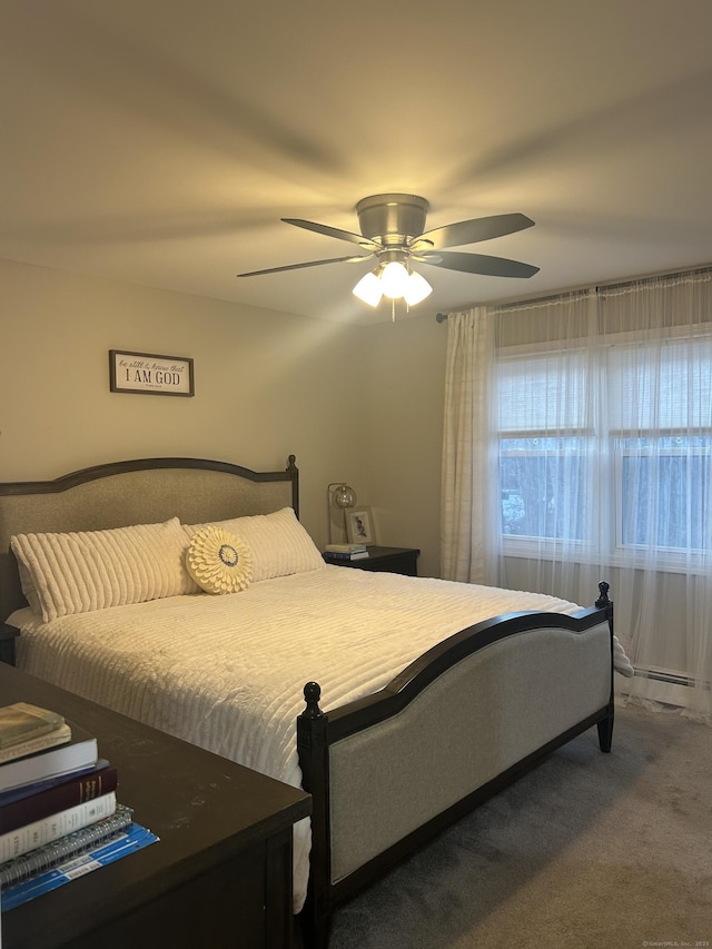 carpeted bedroom with a ceiling fan