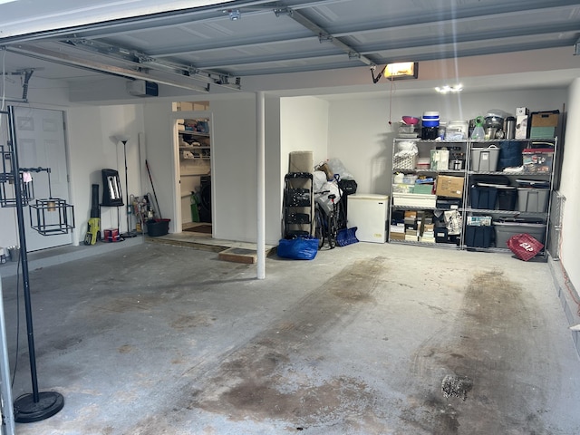 garage featuring a garage door opener