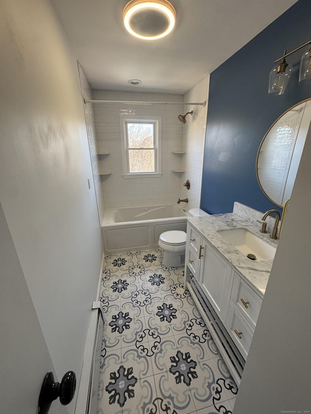 bathroom with tile patterned floors, toilet, shower / tub combination, and vanity