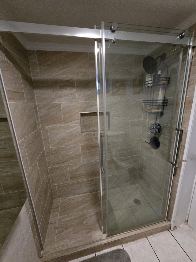 bathroom with a stall shower