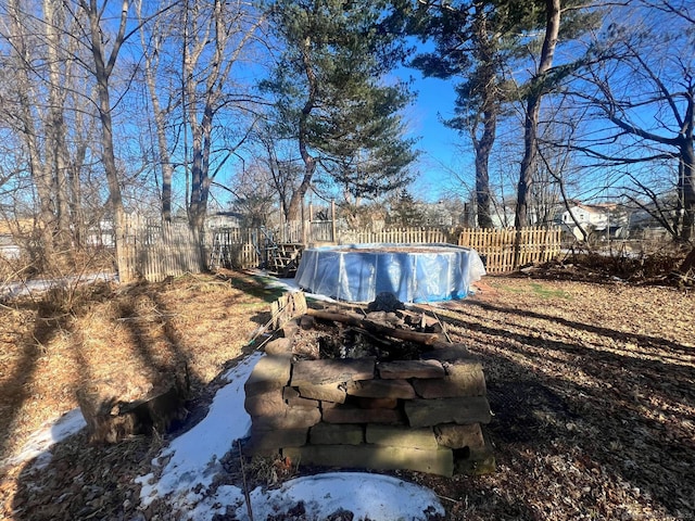 exterior space with fence and a fenced in pool