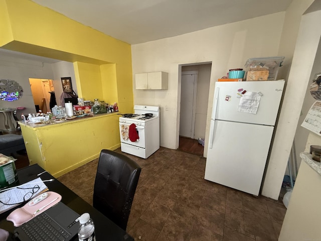 kitchen with white appliances and light countertops