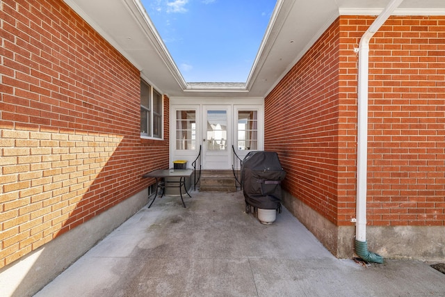 view of patio featuring entry steps and area for grilling