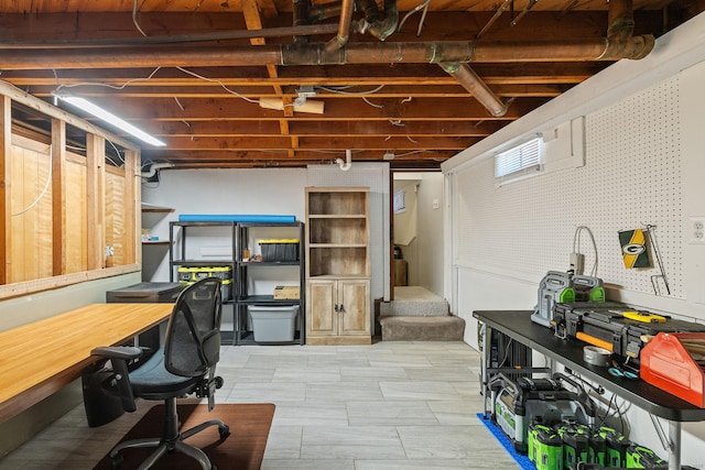 below grade area with a workshop area