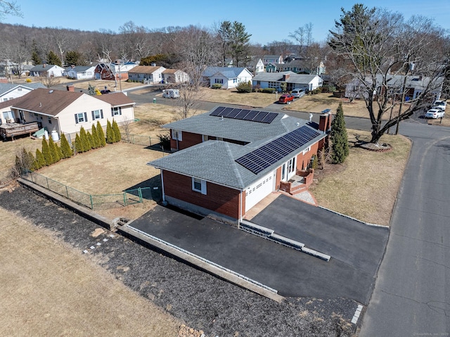birds eye view of property with a residential view