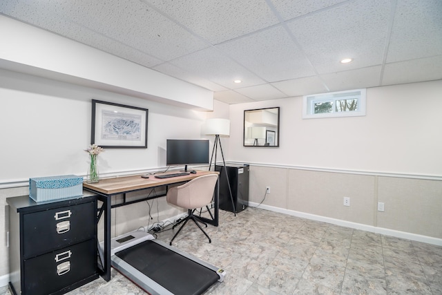 office with recessed lighting, a drop ceiling, and baseboards