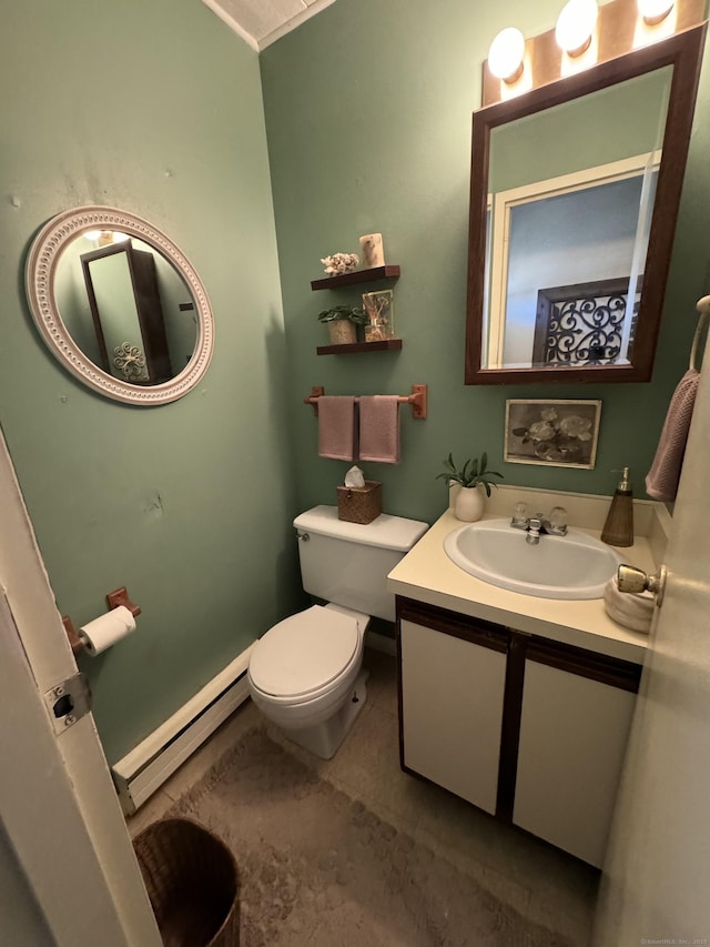 half bath with vanity, a baseboard radiator, tile patterned flooring, and toilet