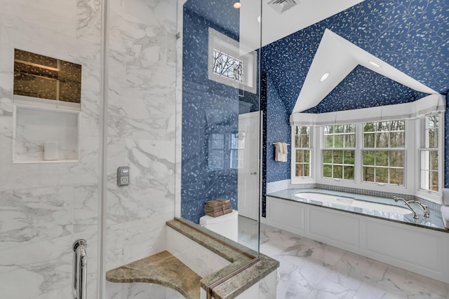 full bathroom featuring marble finish floor, wallpapered walls, a shower stall, and a garden tub