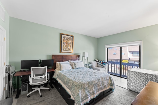 carpeted bedroom featuring access to outside and visible vents