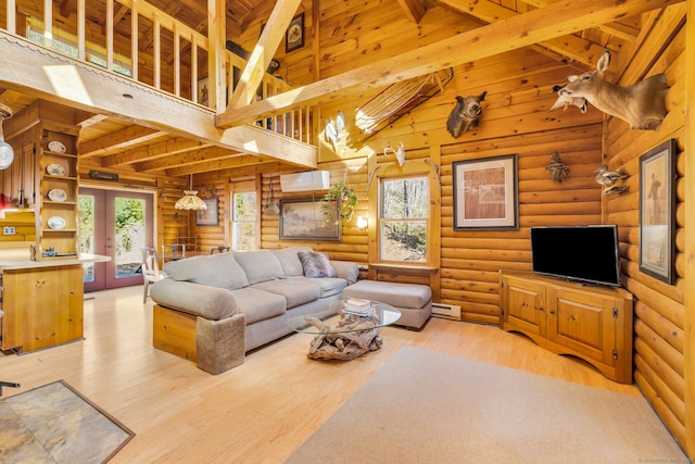 living area with french doors, high vaulted ceiling, baseboard heating, and light wood finished floors