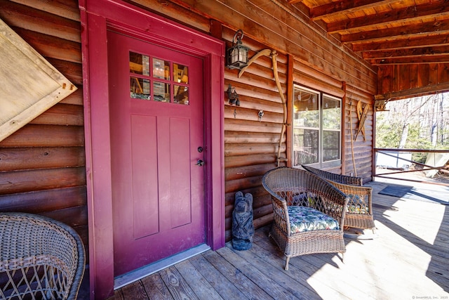 property entrance with a porch