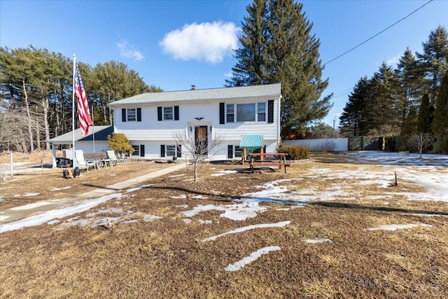 split foyer home with fence