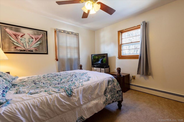 carpeted bedroom with a baseboard heating unit and a ceiling fan