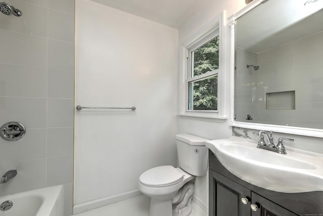 bathroom featuring shower / washtub combination, baseboards, vanity, and toilet