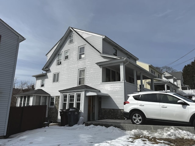 view of front of house with fence