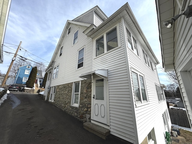 view of front facade with stone siding