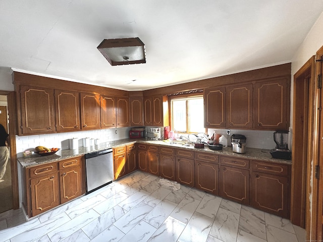 kitchen with marble finish floor, dark stone counters, backsplash, and stainless steel dishwasher