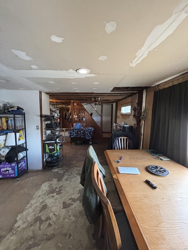 dining area featuring concrete flooring